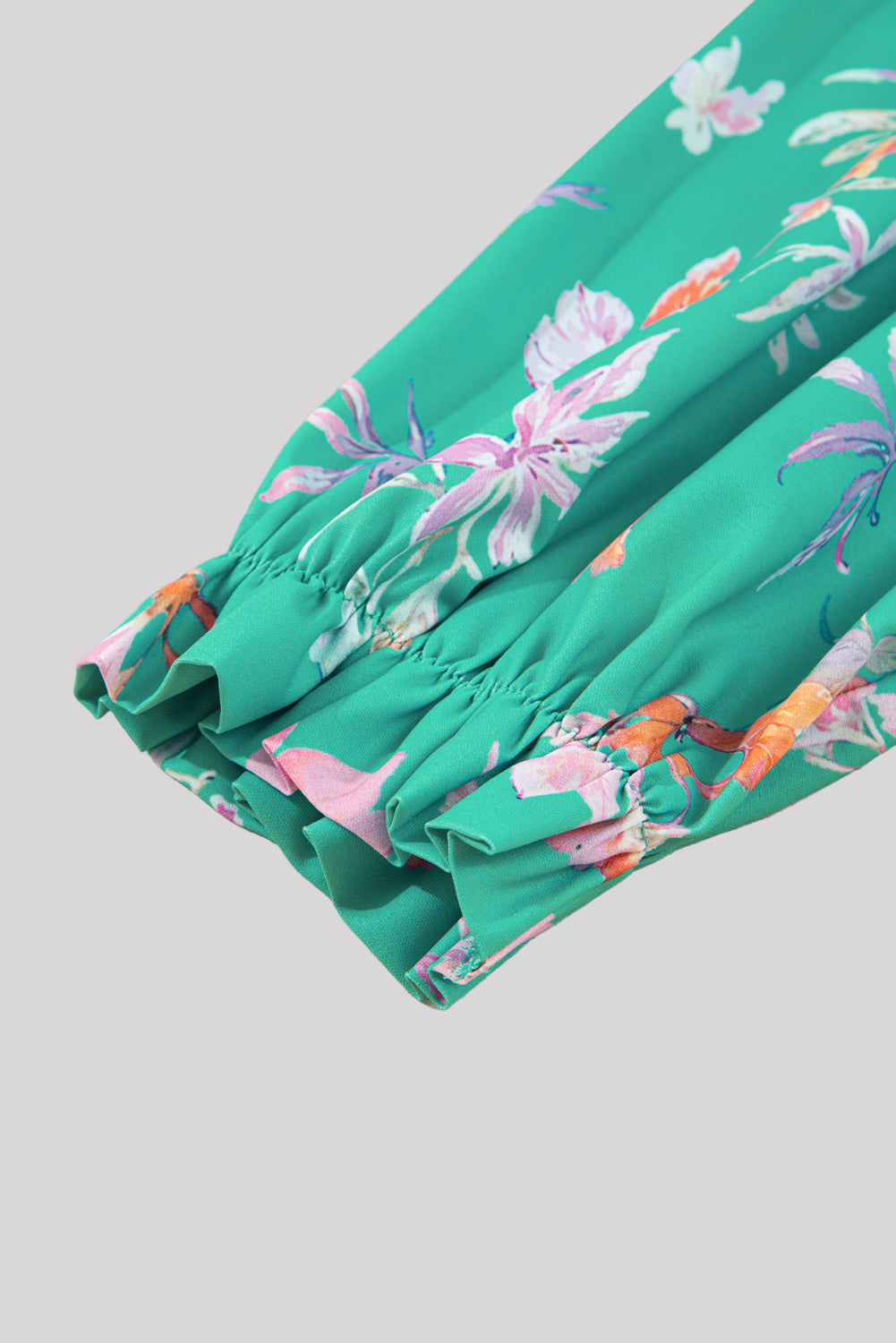 Turquoise floral blouse