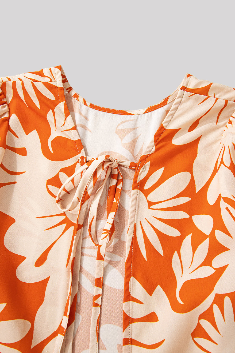 Open back orange blouse