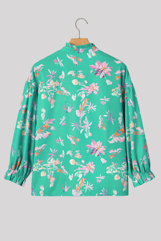 Turquoise floral blouse