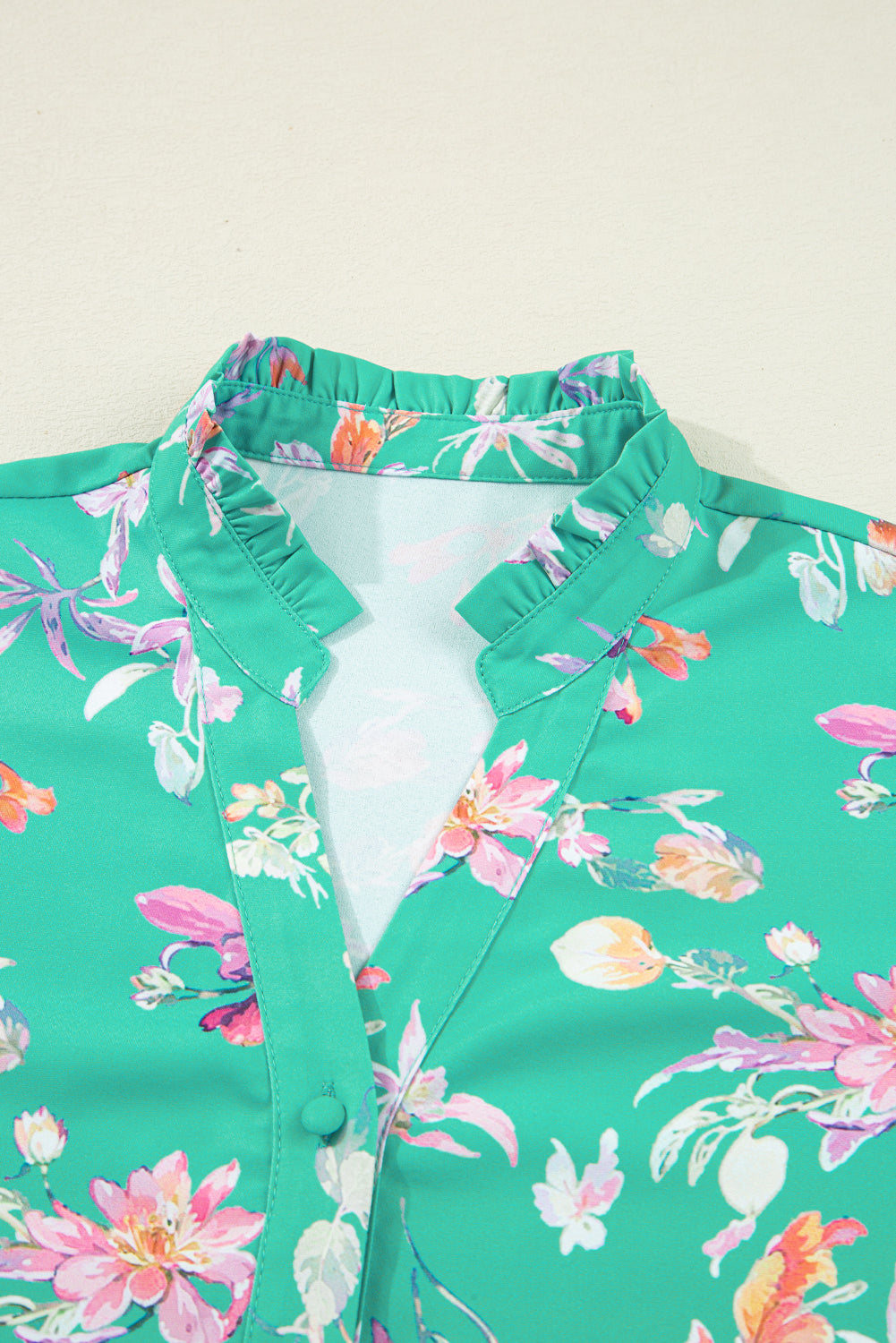 Turquoise floral blouse