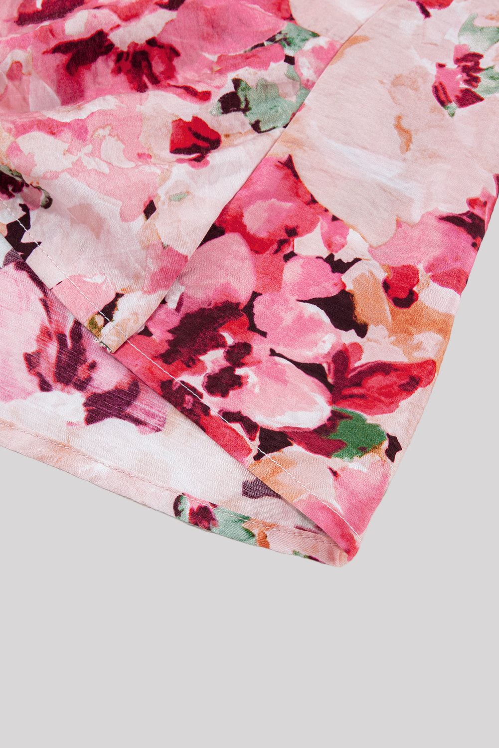 Pink floral open-back blouse