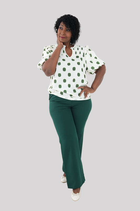 White & green polka dot blouse